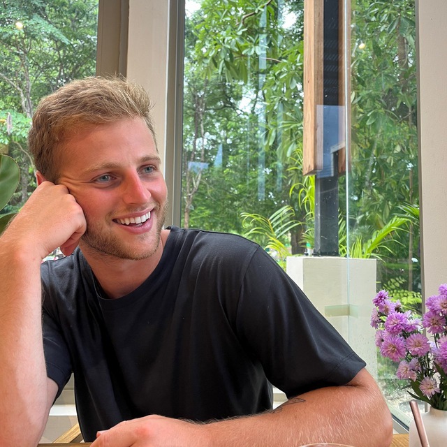 Jack smiling in a natural setting